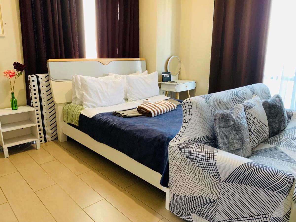 Two Palm Tree Villas Condominium - Studio 8Th Fl With Balcony - Across Terminal 3 Airport Pasay Buitenkant foto